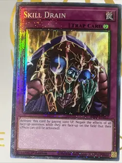 Yu-Gi-Oh! Skill Drain 1st Edition Prismatic Ultimate Rare Card RA02-EN077 - Image 1