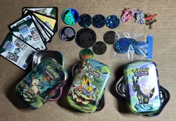 Pokemon TCG lot of Coins Jumbo and Standard/Pins/Redeem Codes/Tins empty - Image 1