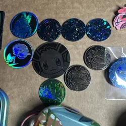 Pokemon TCG lot of Coins Jumbo and Standard/Pins/Redeem Codes/Tins empty - Image 3