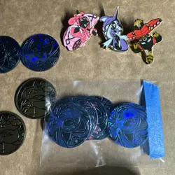 Pokemon TCG lot of Coins Jumbo and Standard/Pins/Redeem Codes/Tins empty - Image 4