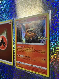 Pokemon TCG Rare Holo: GO 010/078 Charizard; Vivid Voltage 154/185 Leon - Image 3