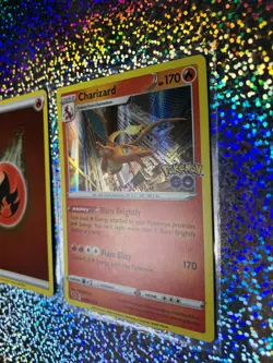 Pokemon TCG Rare Holo: GO 010/078 Charizard; Vivid Voltage 154/185 Leon - Image 4