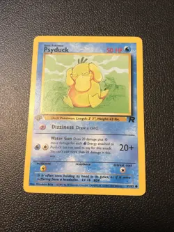 Psyduck 65/82 Team Rocket 1st First Edition Pokemon Card In NM Condition - Image 1