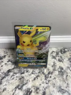 Pikachu GX SM232 - Black Star Promo - Ultra Rare Holo Pokemon Card Near Mint NM - Image 1