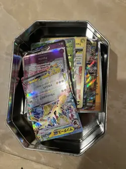 Pokemon TCG Celebrations Lance's Charizard Tin （with Cards) - Image 1