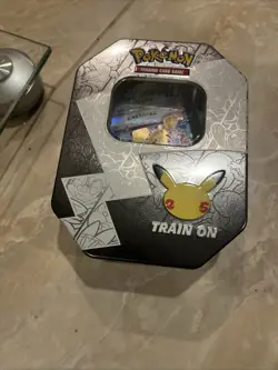 Pokemon TCG Celebrations Lance's Charizard Tin （with Cards) - Image 3