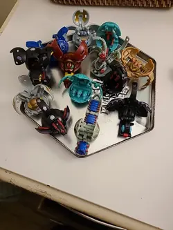 Bakugan Battle Brawlers Tin With 13 Collectible Figures Cards Included! - Image 1