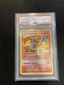 2016 Pokemon X/Y Charizard Holo NM-MT 11/108 PSA 8 - Image 1