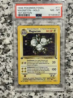 1999 POKEMON FOSSIL MAGNETON #11 HOLO 1ST EDITION PSA 8 - Image 1