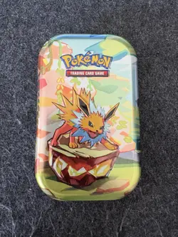 Pokemon TCG: Scarlet & Violet Prismatic Evolutions Sealed Mini Tin - Image 1