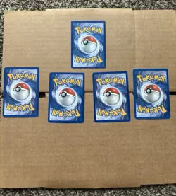 Pokemon Stamped Holo Rayquaza, Starmie, Lickitung, Numel & Kabutops Card Lot - Image 2