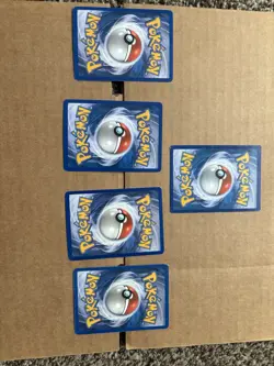 Pokemon Stamped Holo Rayquaza, Starmie, Lickitung, Numel & Kabutops Card Lot - Image 3