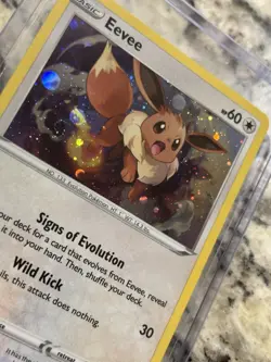 Eevee (Cosmos Holo) SWSH Black Star SWSH042 Pokemon Card NM SWIRL💫 - Image 1