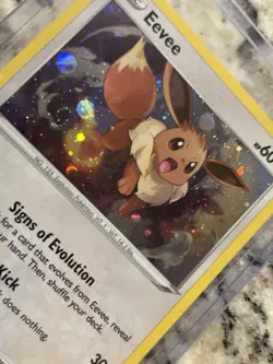 Eevee (Cosmos Holo) SWSH Black Star SWSH042 Pokemon Card NM SWIRL💫 - Image 2