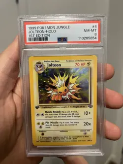 1999 Pokemon PSA 8 1st Edition Jolteon Holo Jungle #4 - Image 1