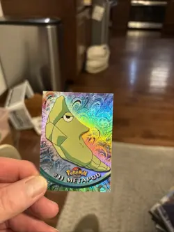 1999 Topps #11 Metapod Holo Rainbow Foil TV Pokemon Animation Series 1 Blue Logo - Image 1