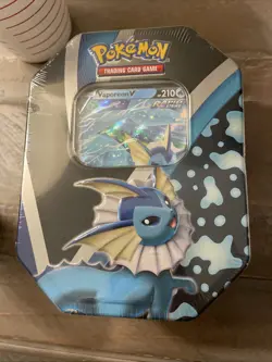 Pokemon Trading Card Game: Eevee Evolutions Tin - Vaporeon V - Image 1