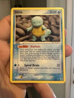 Ditto (Squirtle) 64/113 - Delta Species Pokemon TCG LP With Slight Bend - Image 1
