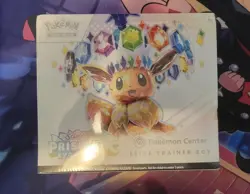 Prismatic Evolutions Pokemon Center ETB Sealed W/tiny Rip Corner - Image 1