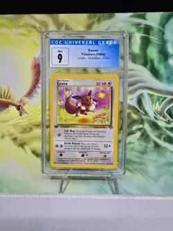 Pokemon Eevee 1st Edition 51/64 CGC 9 1999 WOTC Jungle TCG - Image 1