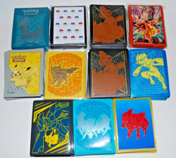 Collection Lot of 11 Pokemon Sleeves Charizard, Pikachu, Eevee, Team-Up and More - Image 1