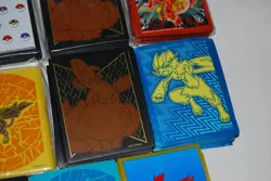 Collection Lot of 11 Pokemon Sleeves Charizard, Pikachu, Eevee, Team-Up and More - Image 5