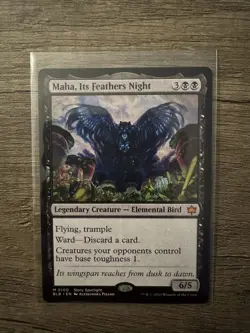 Maha, Its Feather Night [Bloomburrow] Near Mint - Image 1