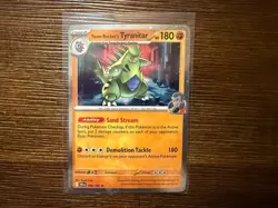 Team Rocket's Tyranitar 096 Pokemon Destined Rivals Cosmos Holo SWIRL Promo Card - Image 1