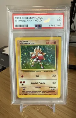 1999 Pokemon Base Set Hitmonchan Holo PSA 7 #7/102 - Image 1