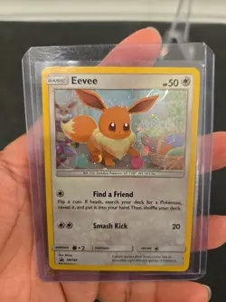 Eevee Ear Pierce Swirl Cosmos Holo SM184 Promo Card Pokemon Eevee Unbroken Bonds - Image 1