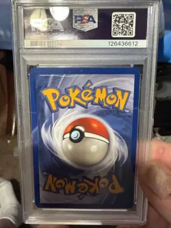 1999 POKEMON FOSSIL 1ST EDITION #53 PSYDUCK PSA 7 - Image 2