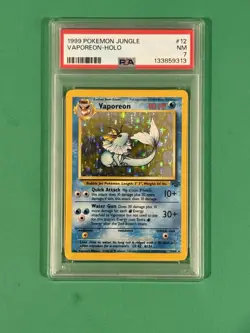 1999 Pokemon Vaporeon Jungle Holo 12/64 PSA 7 - Image 1