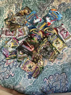 Pokemon Mystery Pack Includes 4 Factory Sealed Booster Packs ( Read Description) - Image 1
