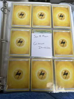 Pokemon TCG Sun & Moon Crimson Invasion Card Lot Binder - Image 1