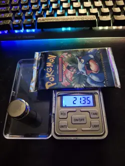 HEAVYU! 21.35g PORTUGUESE 1999 Pokemon Base Set Pack - Image 1