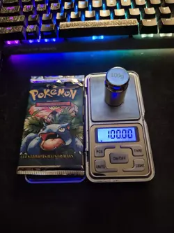 HEAVYU! 21.35g PORTUGUESE 1999 Pokemon Base Set Pack - Image 3