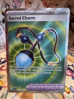 Sacred Charm 122/94 Phantasmal Flames Pokemon TCG Card - Image 1