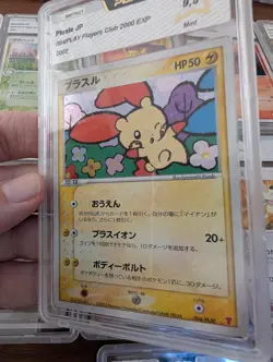 Pokemon Plusle 2000 EXP Points Japanese Exclusive Holo Promo 004/PLAY PSA 9 Mint - Image 1