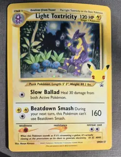LIGHT TOXTRICITY SWSH137 25TH CELEBRATIONS POKEMON (HOLO RARE, NM) - Image 1