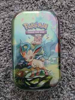 Pokemon Cards - Prismatic Evolutions Leafeon Mini Tin Factory Sealed - Image 1