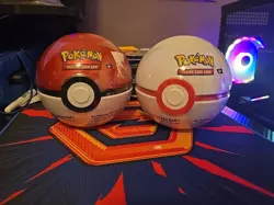 Lot of 2 A24 Pokemon TCG Pokeball Tins with 3 Booster Packs - Image 1