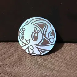 POKEMON MANAPHY BLUE MIRROR HOLO COIN - Image 1