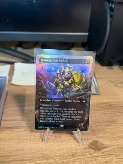 Finneas, Ace Archer (Borderless) (Raised Foil) Bloomburrow Foil Near Mint - Image 1