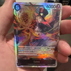 Namco Sabo OP04-083 Kingdoms of Intrigue Super Rare Special Foil 6000 One Piece. - Image 1