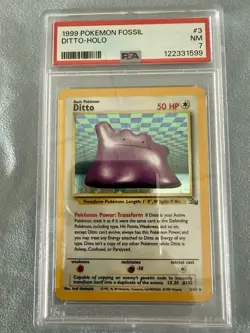 1999 Pokemon Fossil (Ditto-Holo) PSA 7 - Image 1