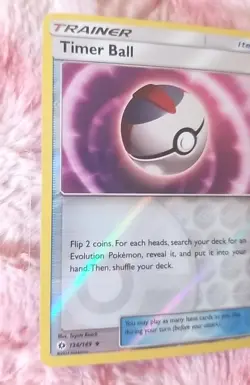 2017 Pokemon TCG Timer Ball 134/149 Reverse Holo Card Sun & Moon - Image 2