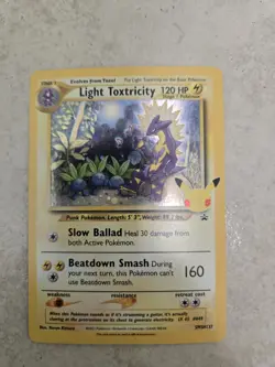 POKEMON CELEBRATIONS LIGHT TOXTRICITY COSMOS HOLO SWSH137 - Image 1