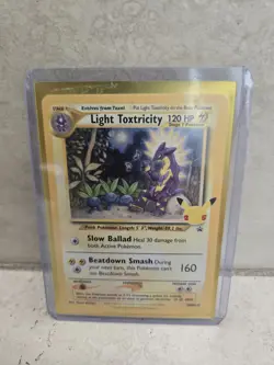 POKEMON CELEBRATIONS LIGHT TOXTRICITY COSMOS HOLO SWSH137 - Image 4