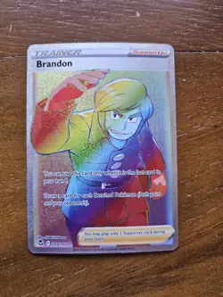 Pokemon TCG Brandon 203/195 Secret Rare Silver Tempest Rainbow Trainer - Image 1