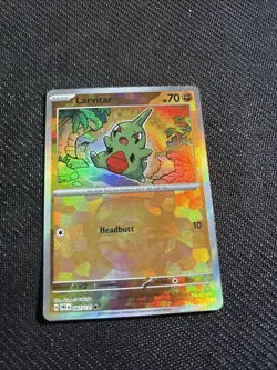 Pokemon TCG Prismatic Evolutions Larvitar 047/131 Reverse Holo Master Ball - Image 1